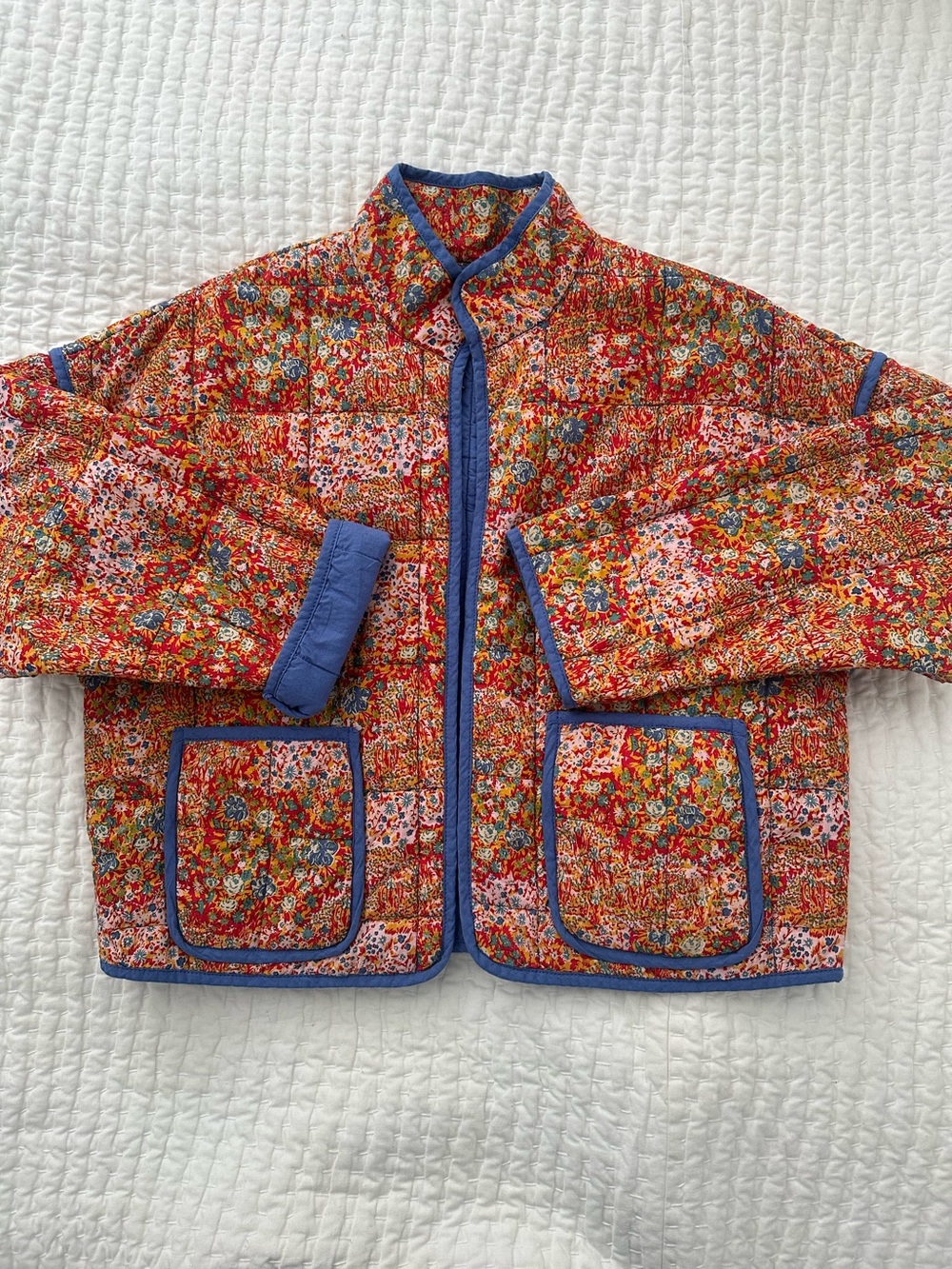 Quilted Floral Jacket with Blue Trim/ hook closure